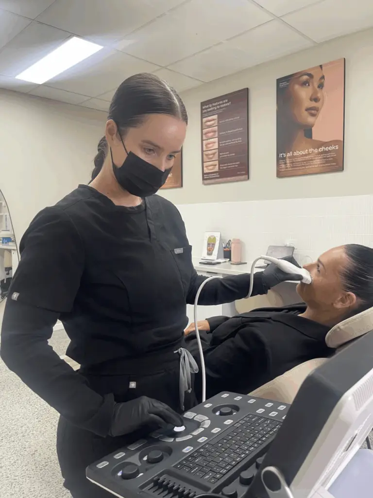cosmetic nurse performing treatment
